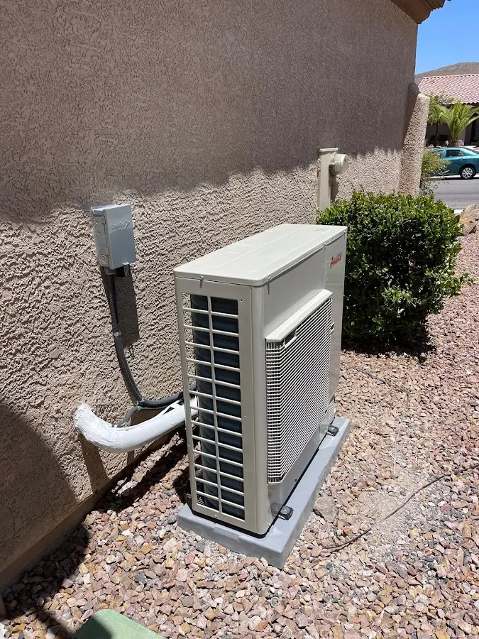 Residential air conditioning condenser unit in Tuckahoe